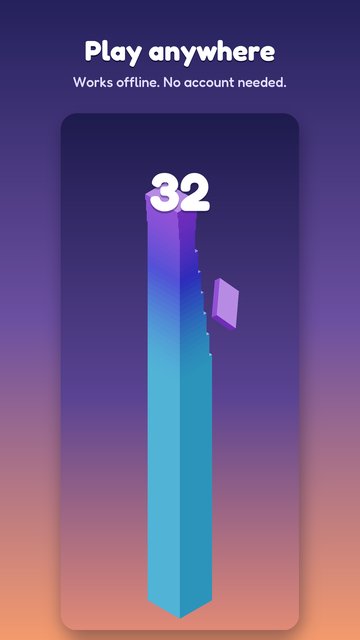 A finished city tower of 32 floors glowing against an orange dusk sky.